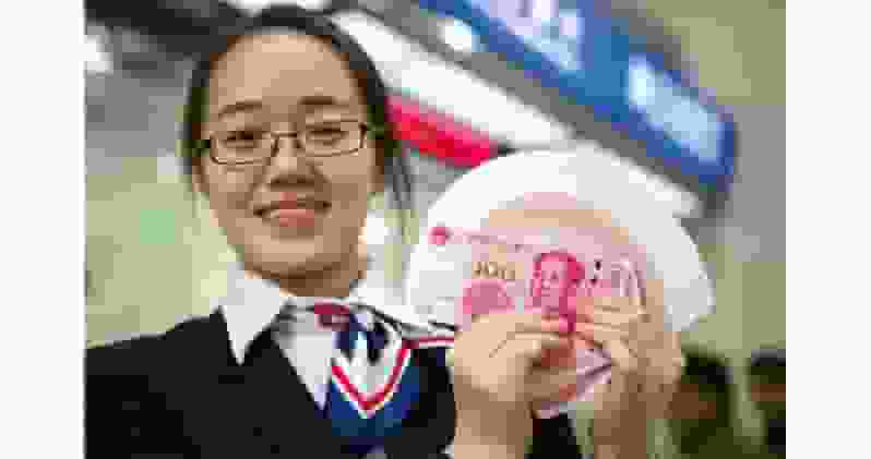 離岸人幣逾一年來首升破7算 高盛料人行傾向匯率平穩升值