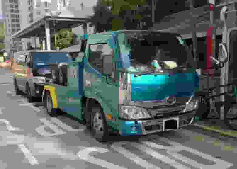 打擊西九龍交通違例拘5人 拖走違泊車輛